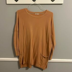 Tea U Rose top in rust color. Light orange